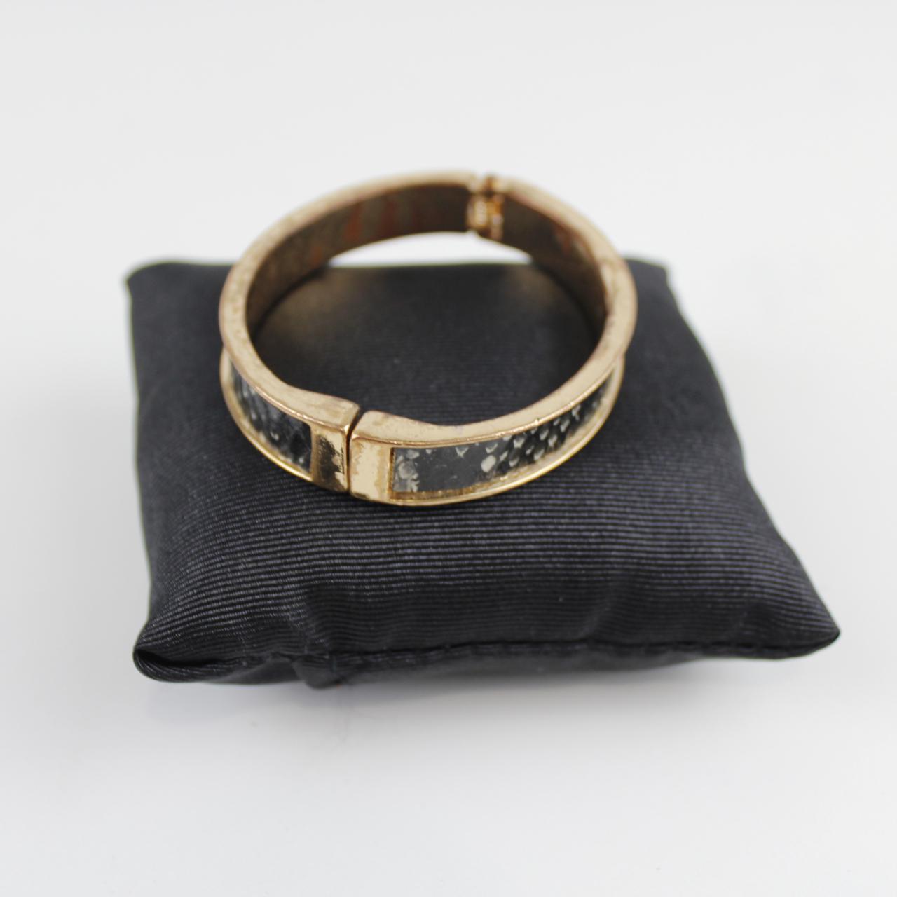 Gold-Tone Bangle Bracelet with Black Inlay - Textured Design