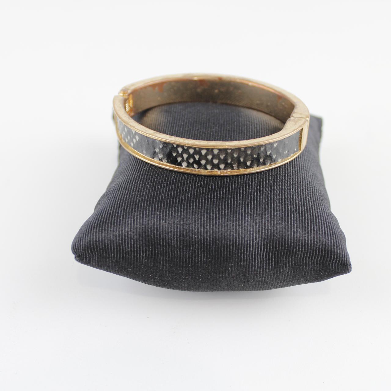 Gold-Tone Bangle Bracelet with Black Inlay - Textured Design