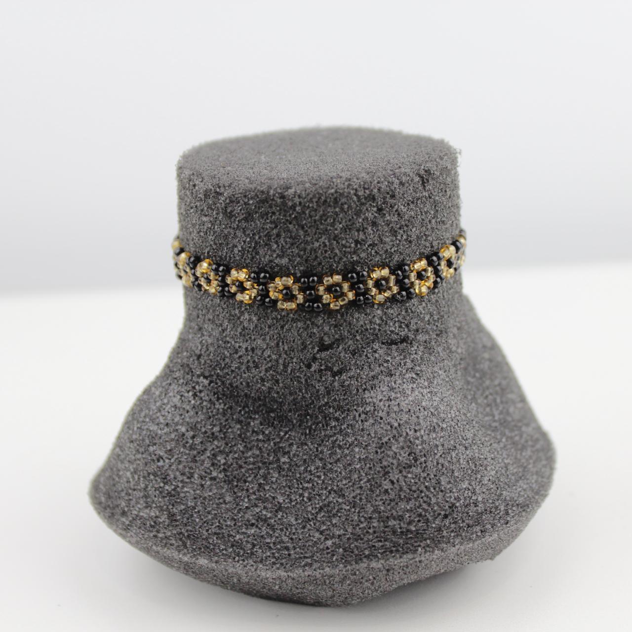 Handcrafted Black and Gold Beaded Floral Bracelet Intricate