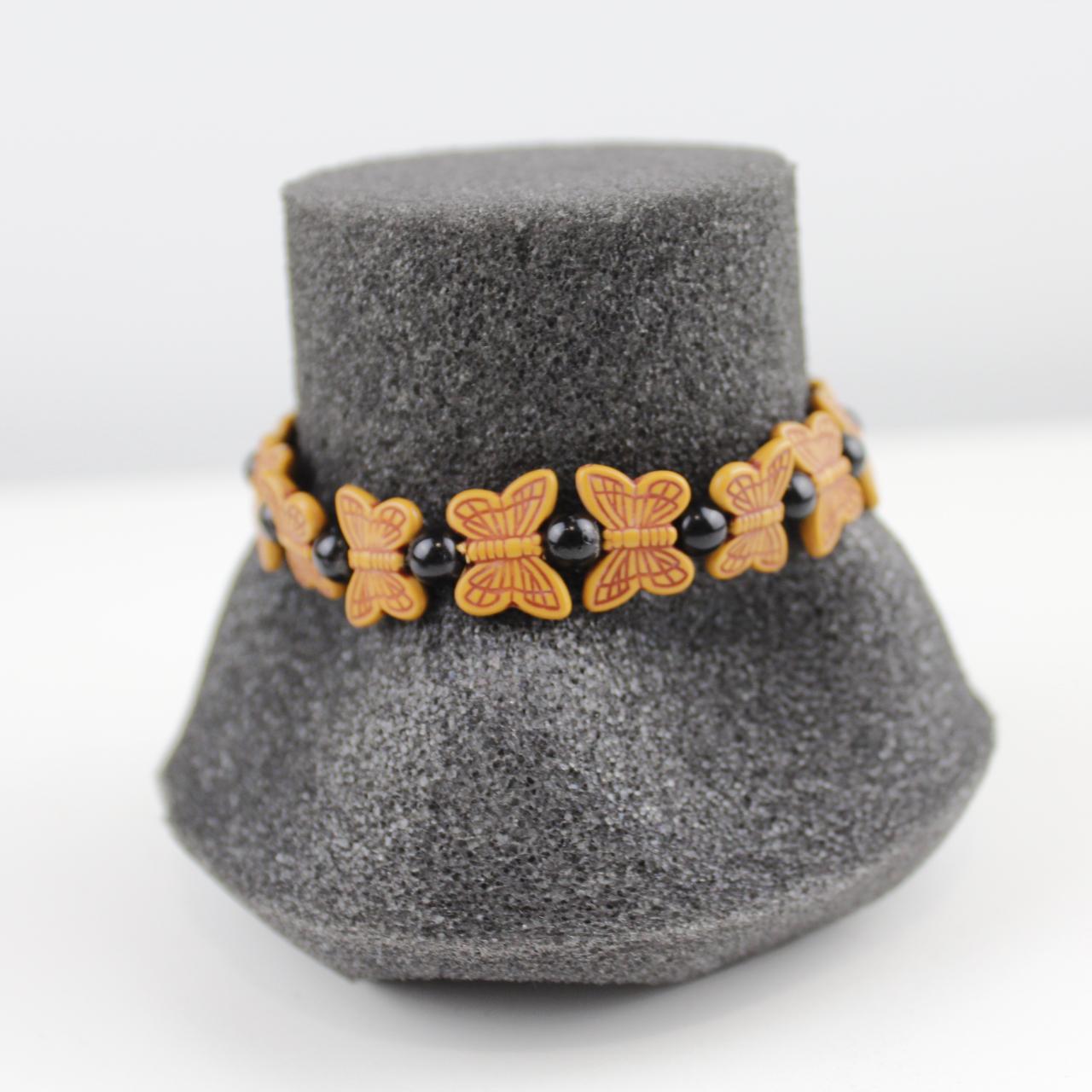 Orange Butterfly Bead Bracelet with Black Spherical Beads -