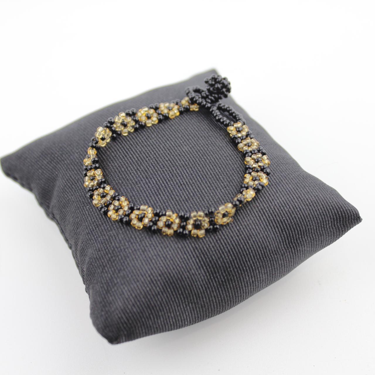 Handcrafted Black and Gold Beaded Floral Bracelet Intricate