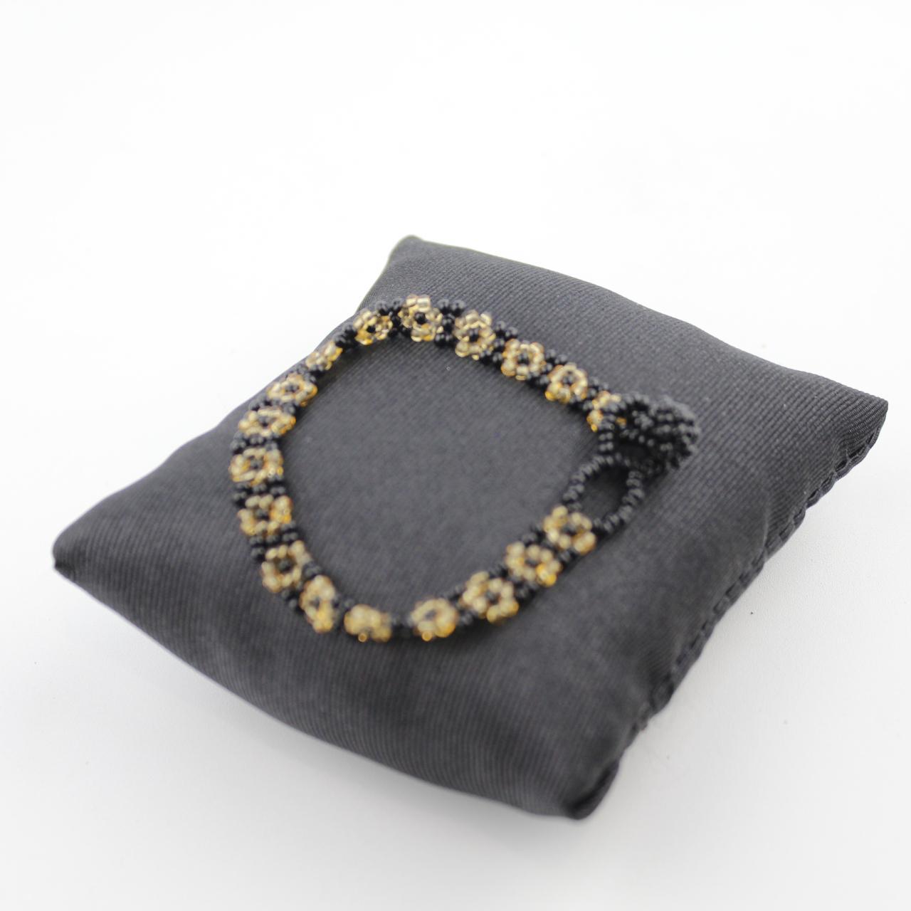 Handcrafted Black and Gold Beaded Floral Bracelet Intricate