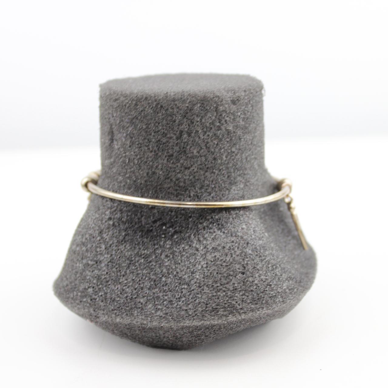 Elegant Gold Beaded Bracelet with Elongated Pendants Fashion
