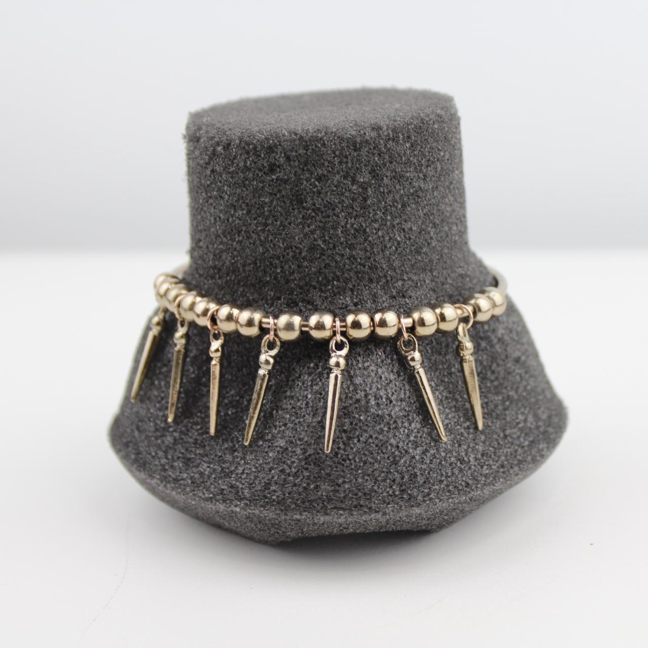 Elegant Gold Beaded Bracelet with Elongated Pendants Fashion