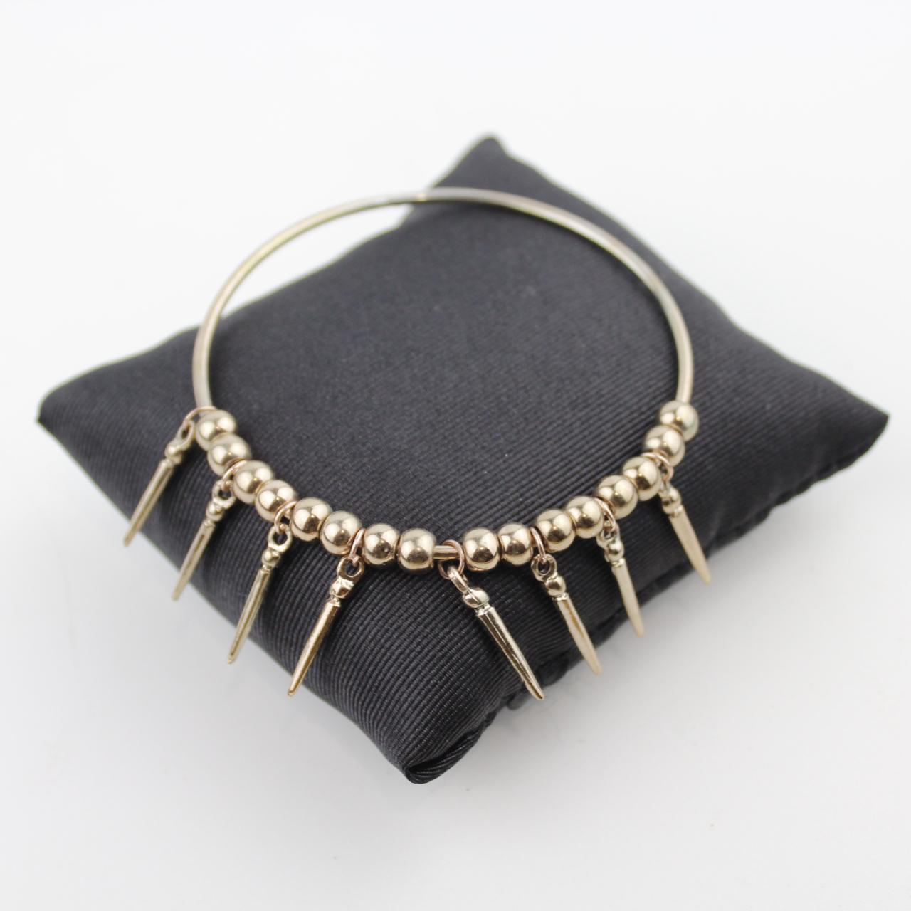 Elegant Gold Beaded Bracelet with Elongated Pendants Fashion