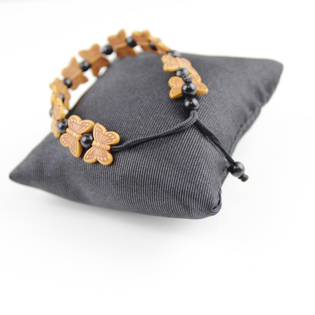 Orange Butterfly Bead Bracelet with Black Spherical Beads -