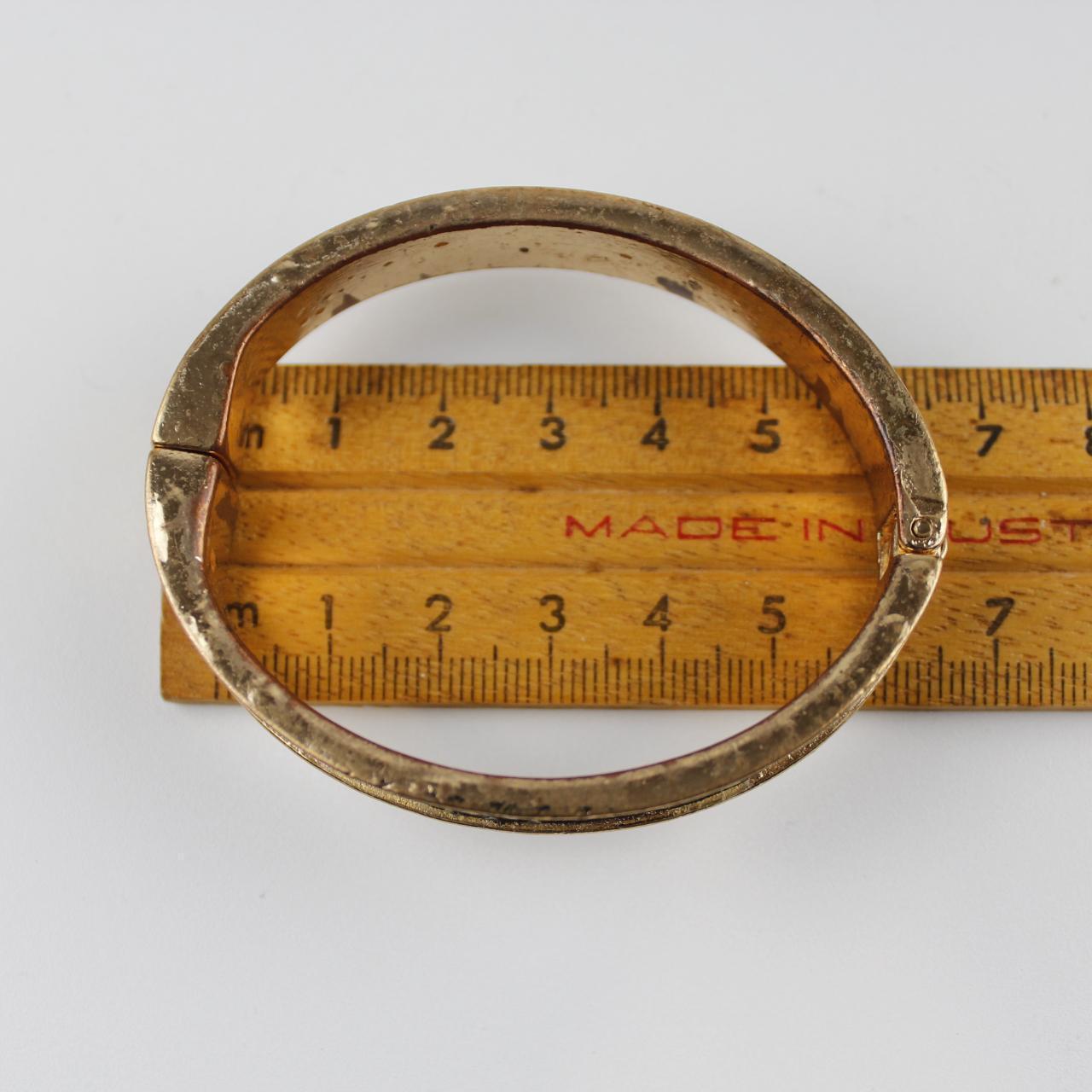 Gold-Tone Bangle Bracelet with Black Inlay - Textured Design